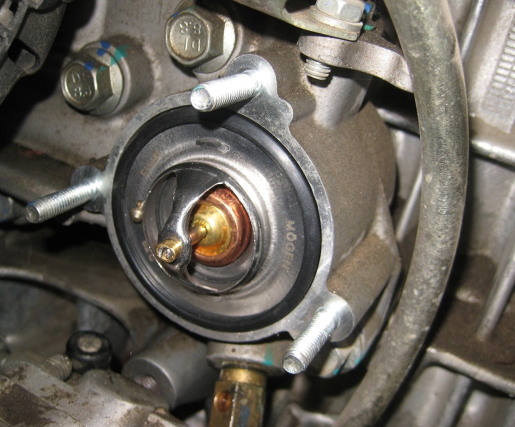 Замена термостата Geely Atlas